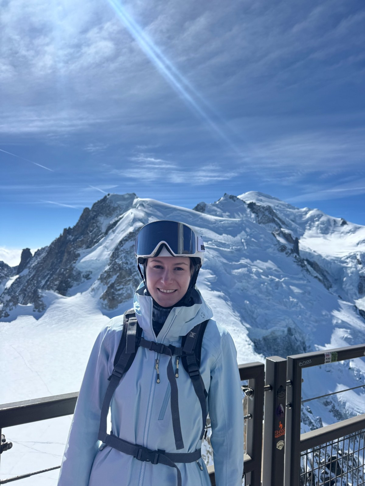 Amanda with ski gear in the snowy mountains